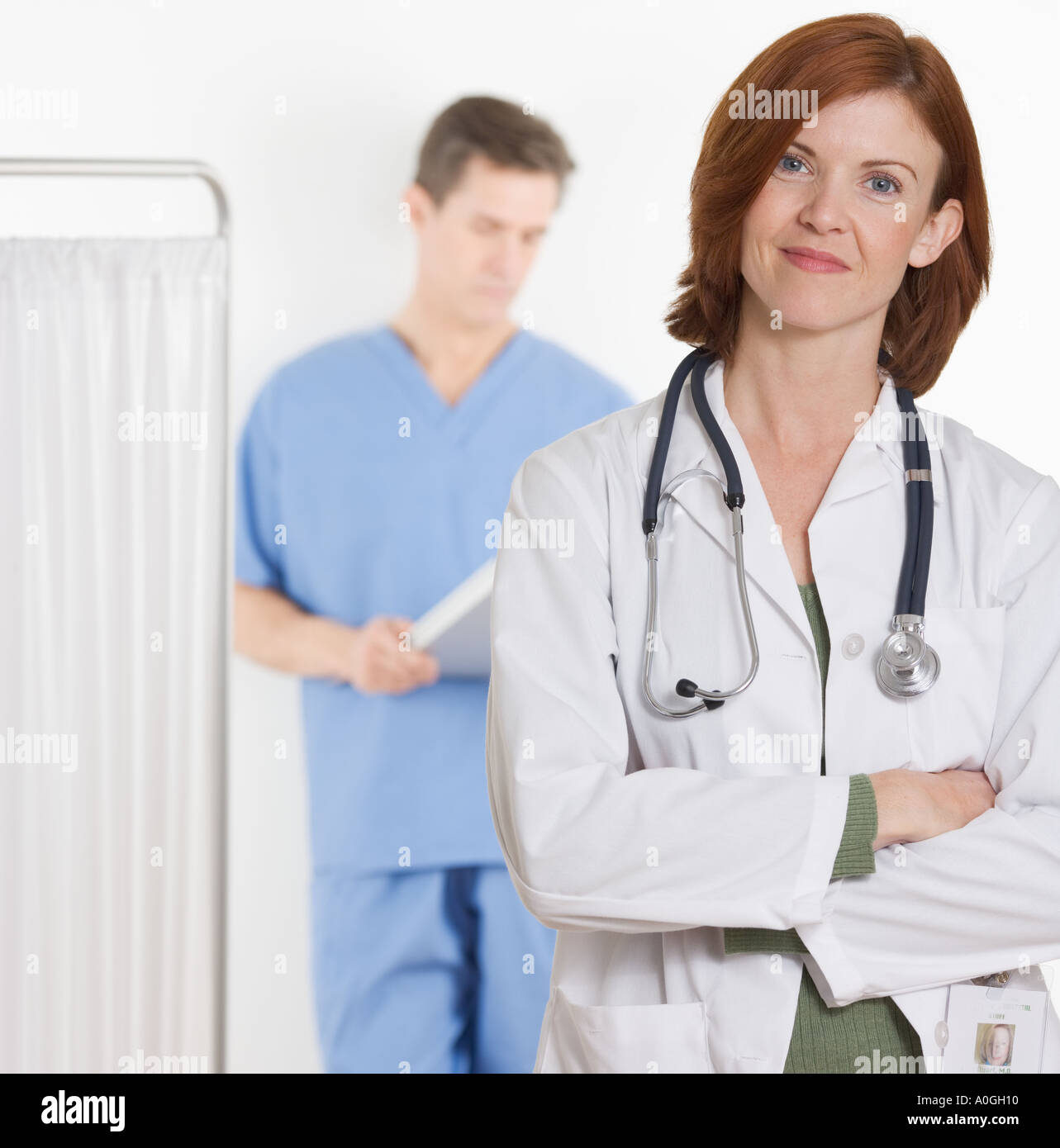 Doctor reading medical charts hi-res stock photography and images - Alamy