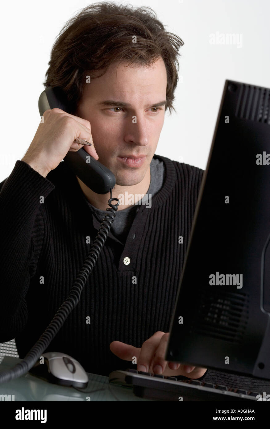 Business man busy telephones hi-res stock photography and images - Alamy