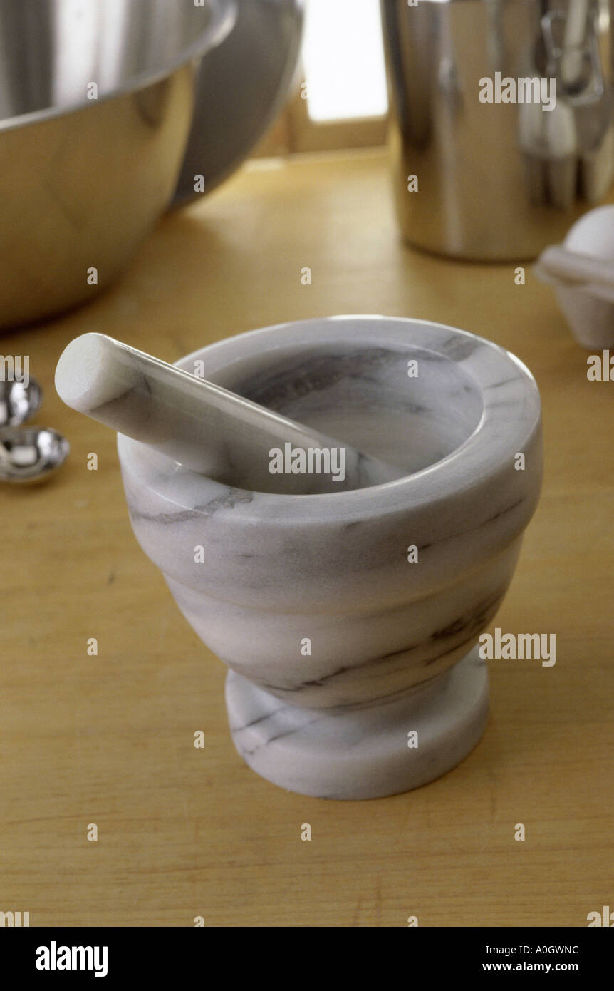 Close-up of a mortar and a pestle Stock Photo