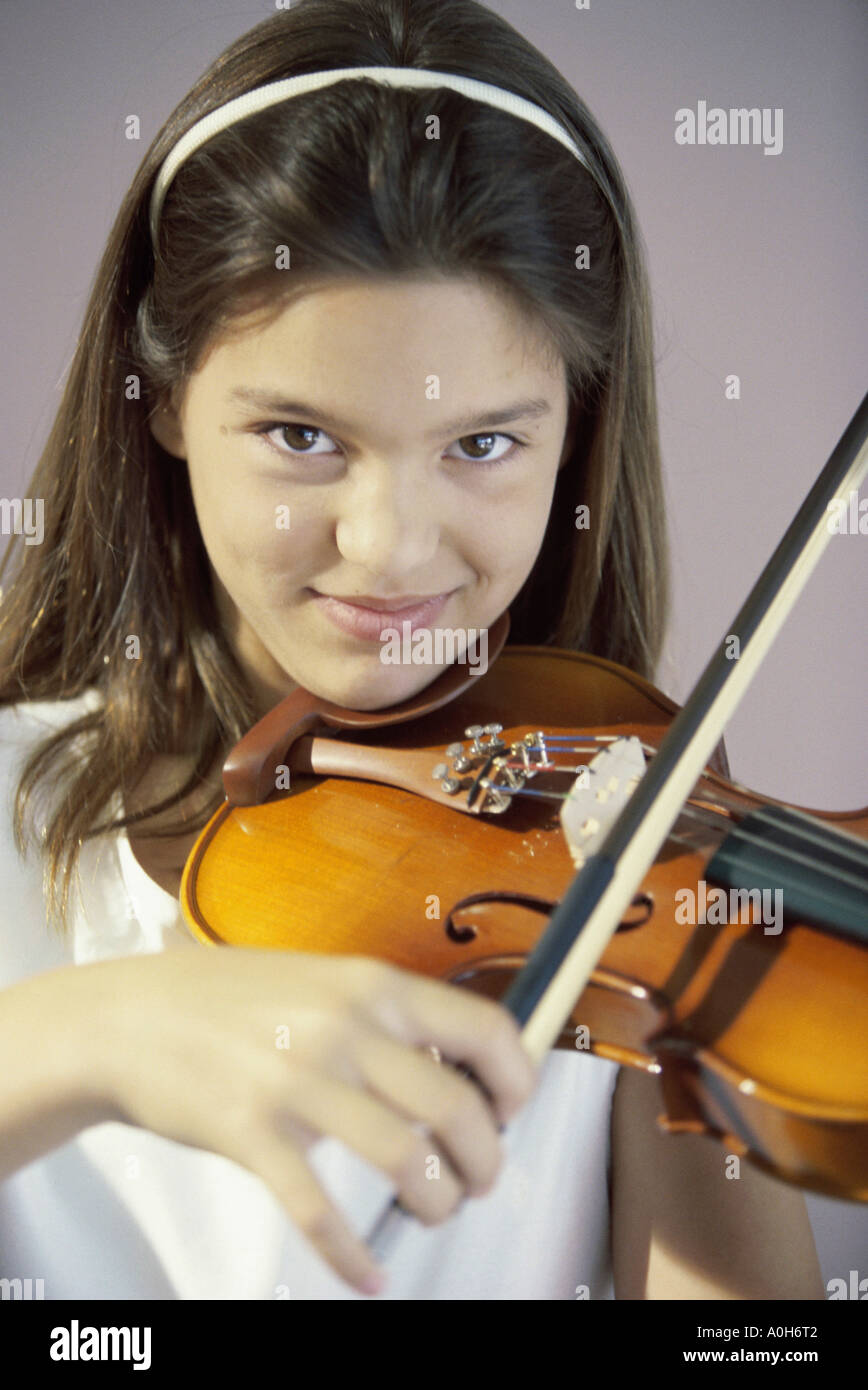 Portrait of a girl playing a violin Stock Photo