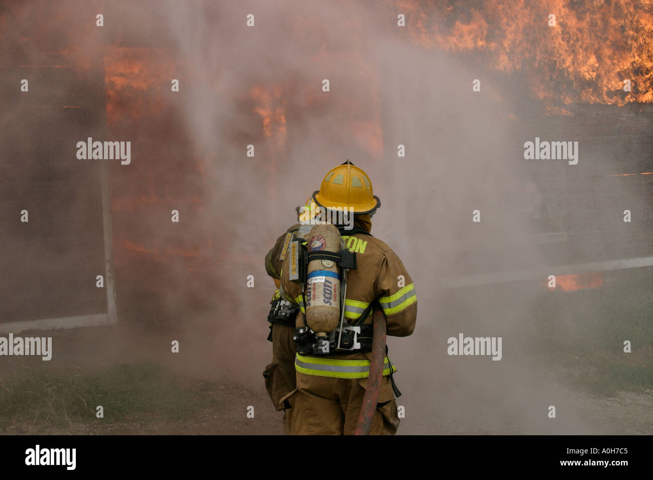 Firefighters Attacking Structure Fire Stock Photo - Alamy