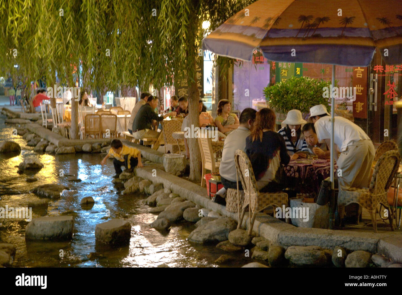 Chinese folks enjoying the good life at night, Dali, Yunnan, China Stock Photo