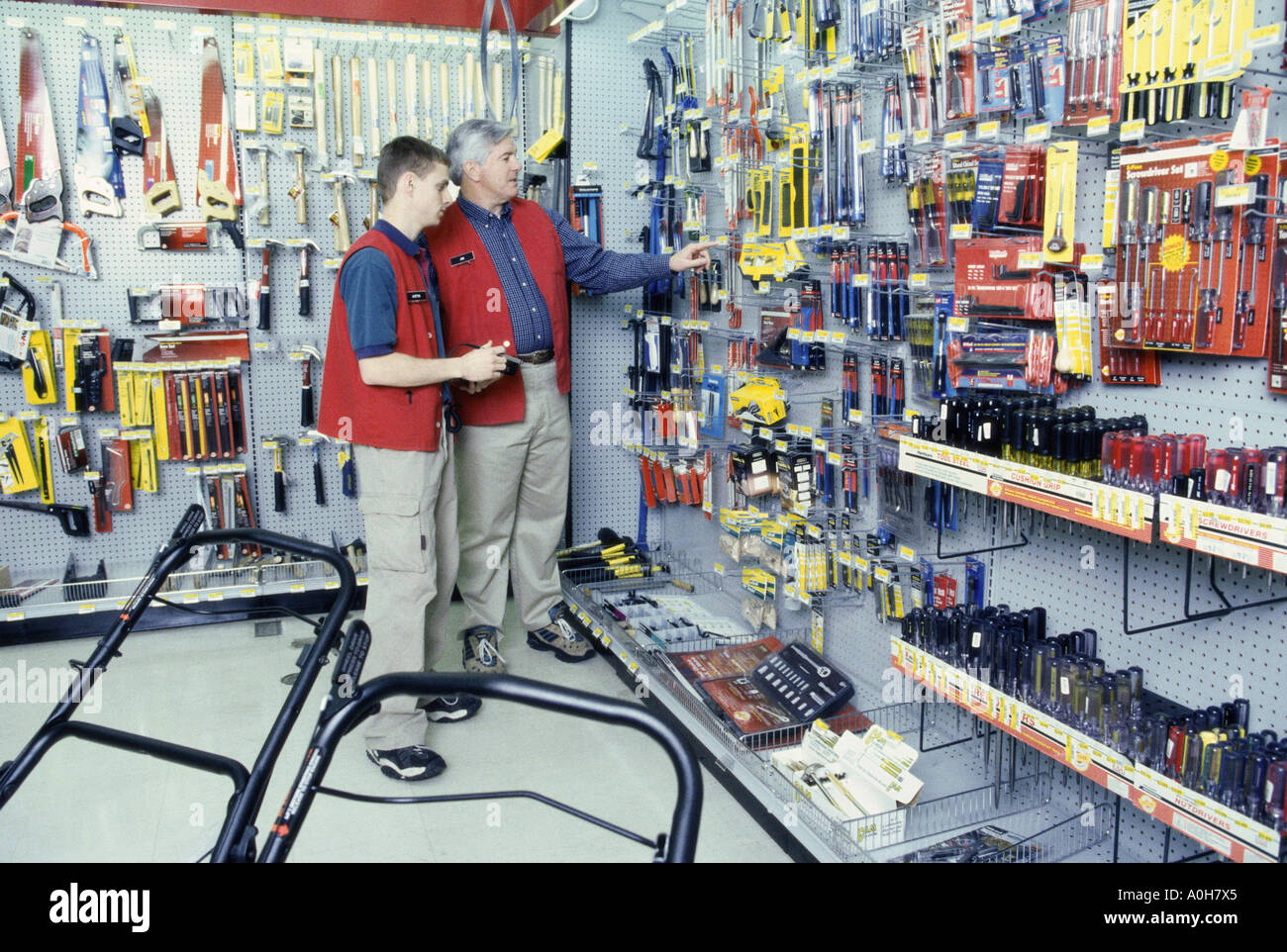 Two male clerks in a hardware store Stock Photo Alamy