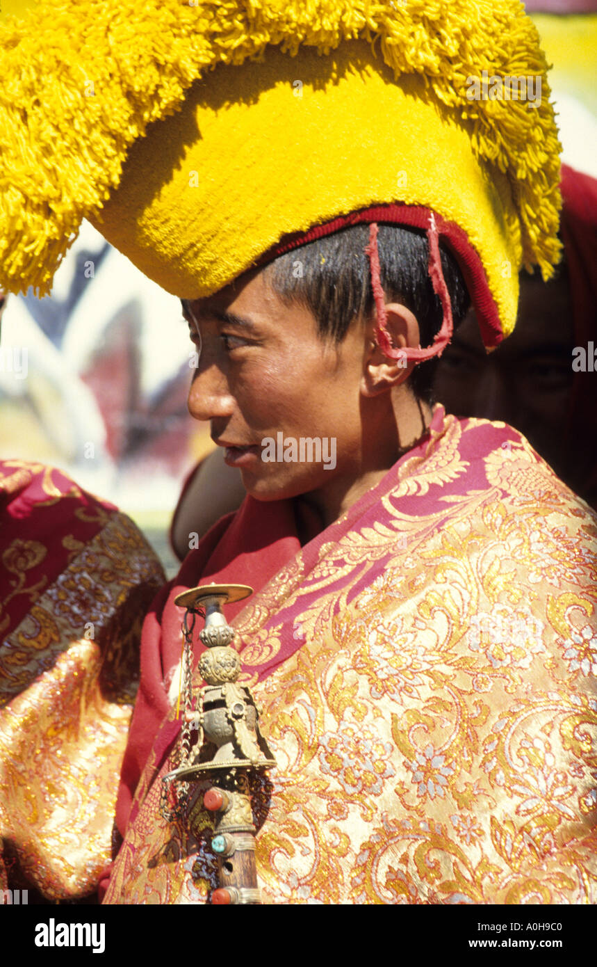 Yellow hatted Bon monk at festival in Tibet Stock Photo