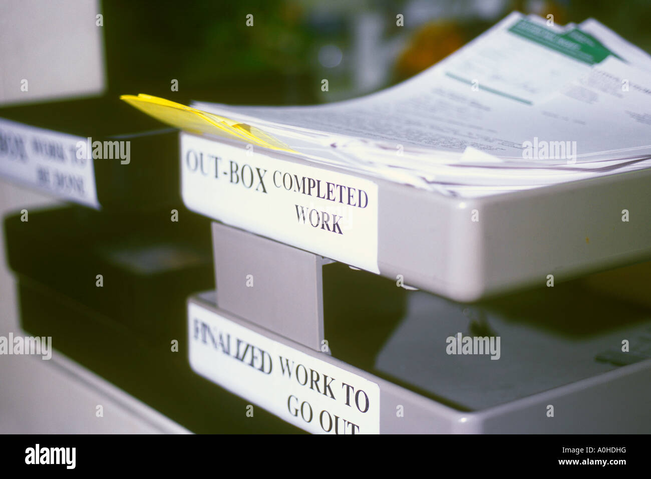 Office equipment In out finalized box on a secretary's work station Stock Photo