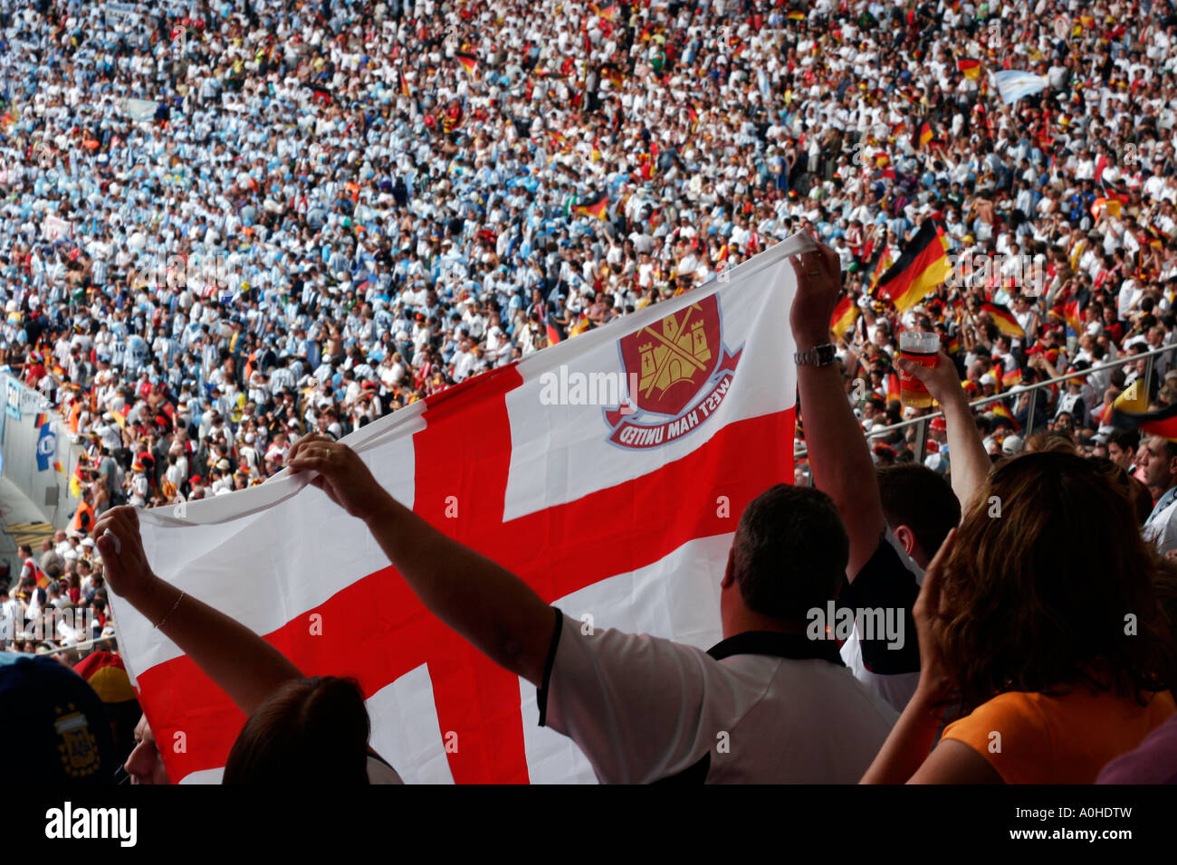 English West Ham fans amongst the crowd in the Berlin stadium at the World Cup quarter finals between Germany and Argentina. Stock Photo