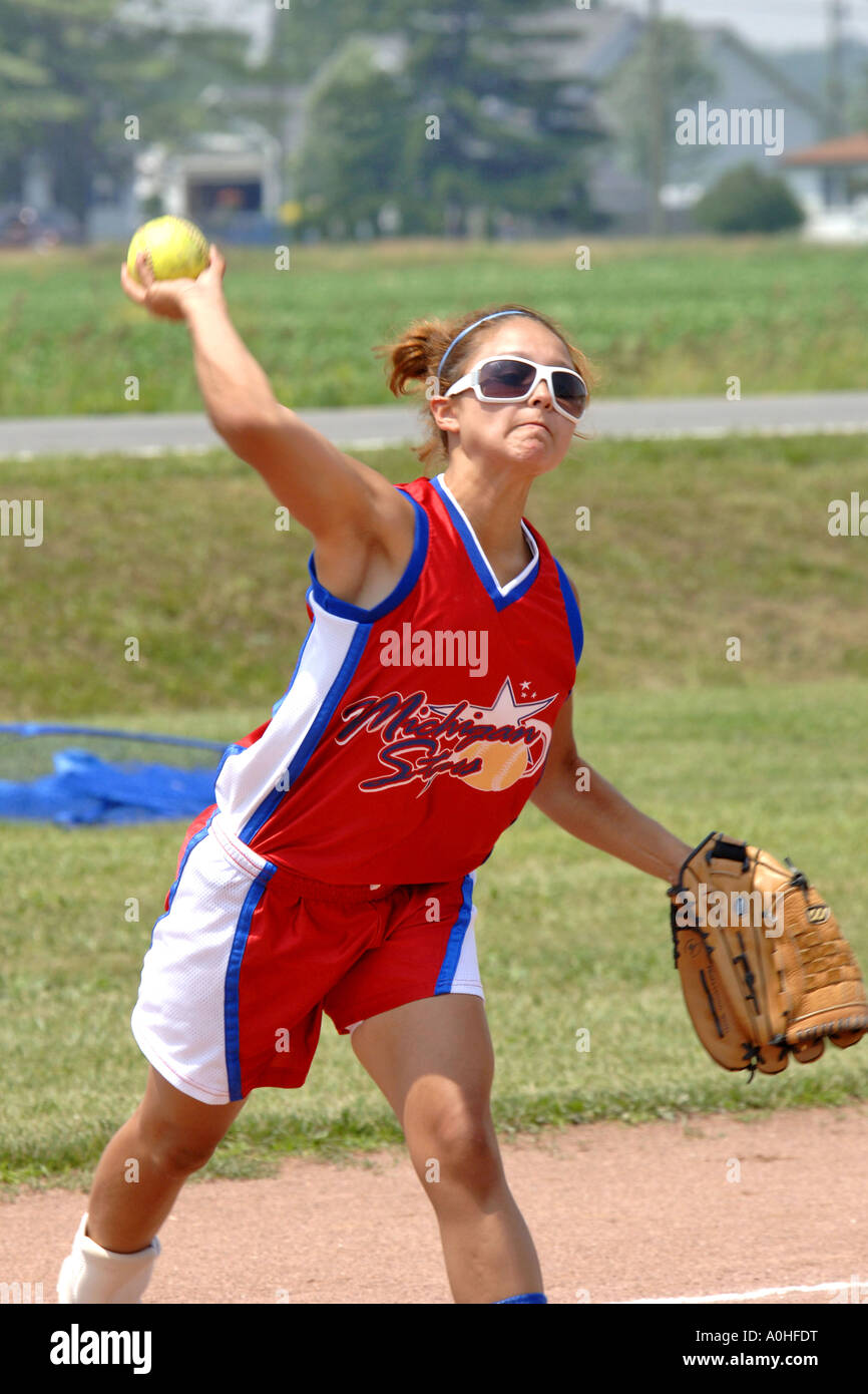 Teenage female Major League Softball player wearing sunglasses Stock
