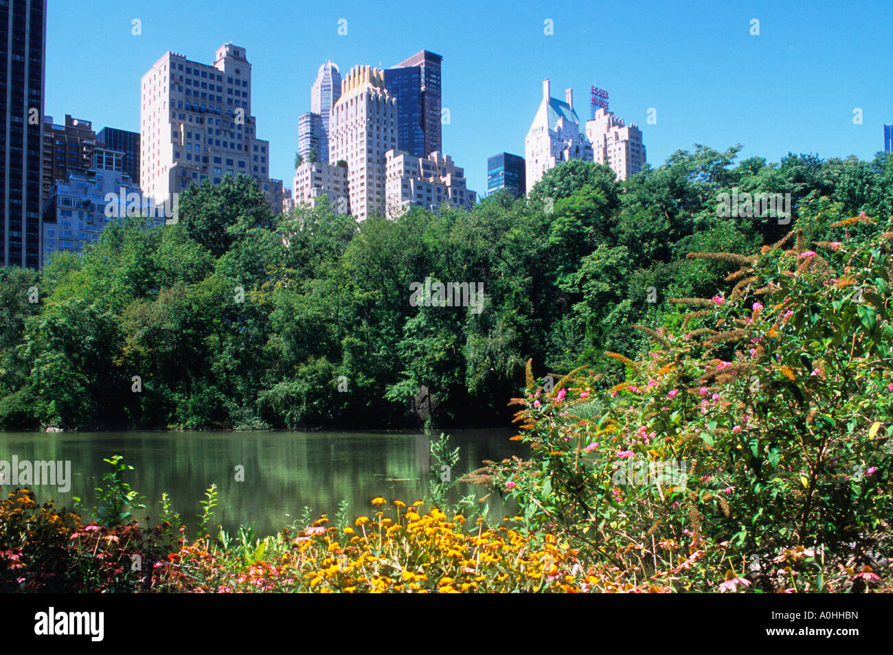 New York City Midtown Manhattan View of Central Park South Across The Lake NYC USA Stock Photo