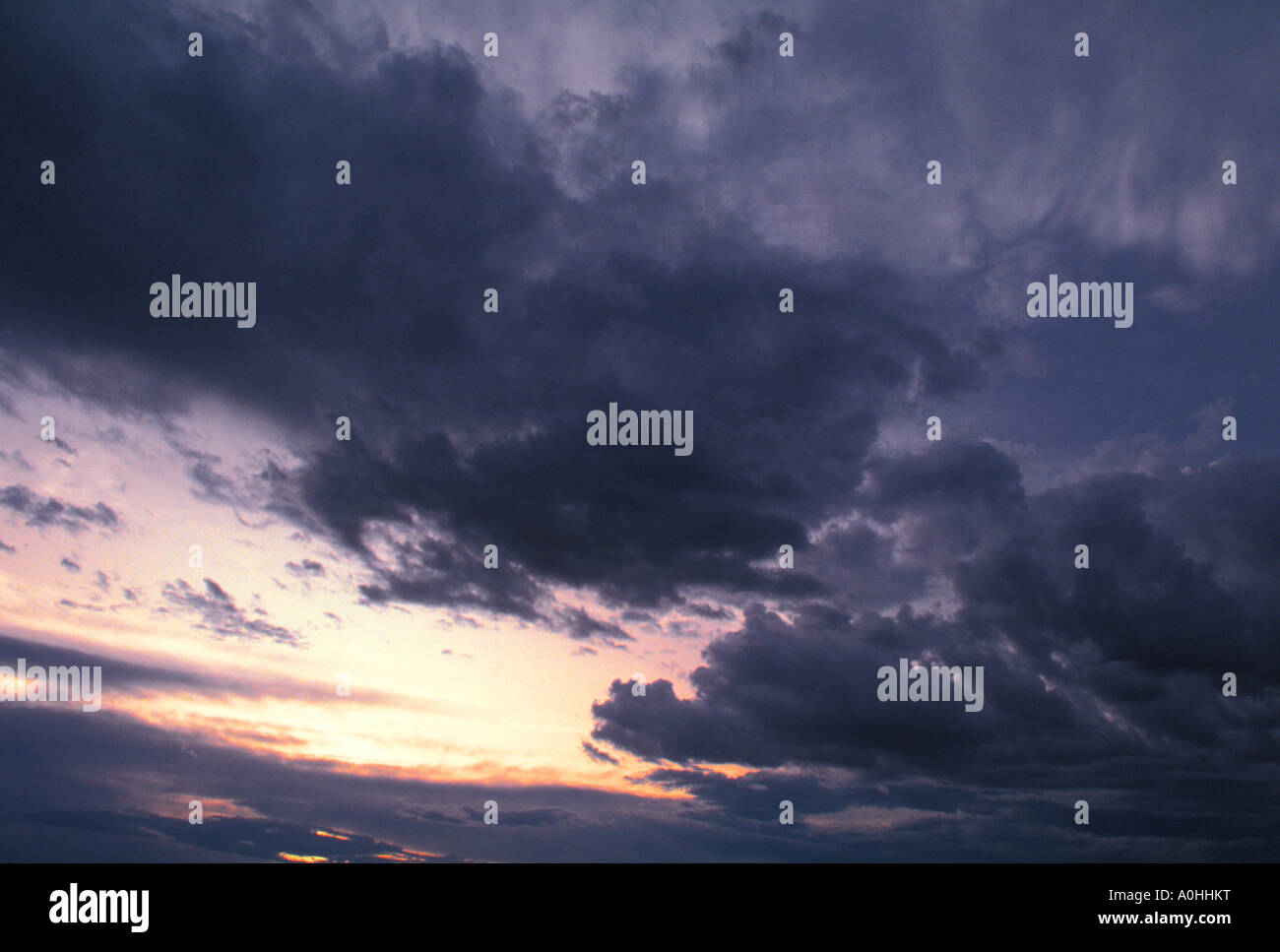 Dramatic sky. Storm clouds. Sunset dark black clouds with sun shining ...