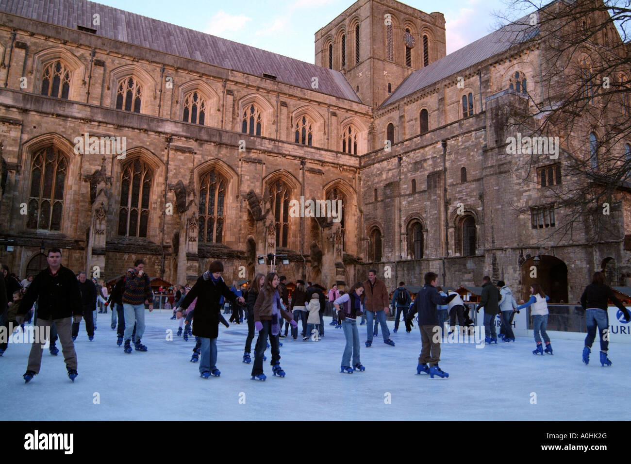Winchester Cathedral ice rink a fund raising venture in the grounds of this historic church Stock Photo