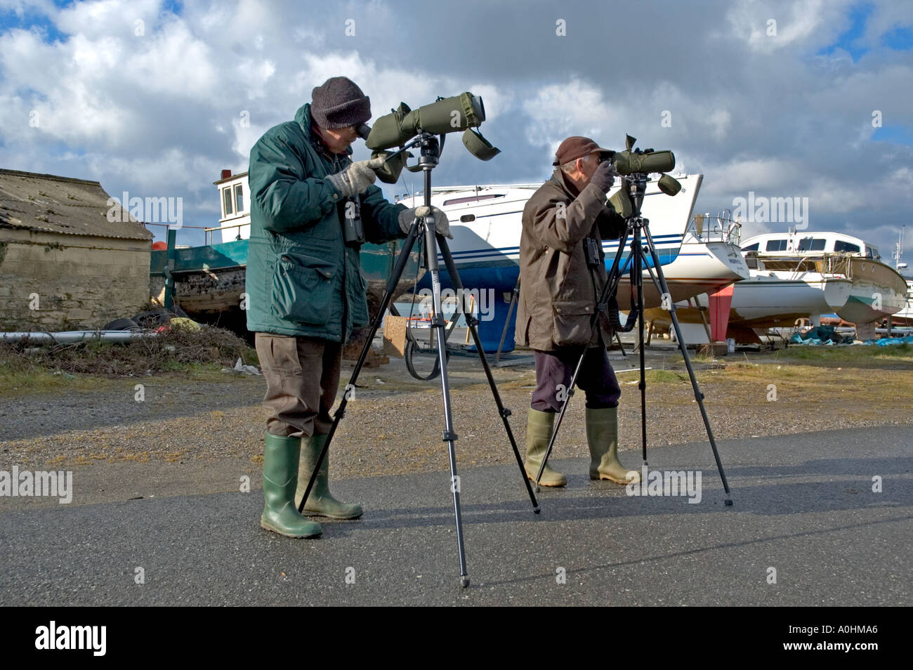 Birdwatchers with there spotting scopes Stock Photo