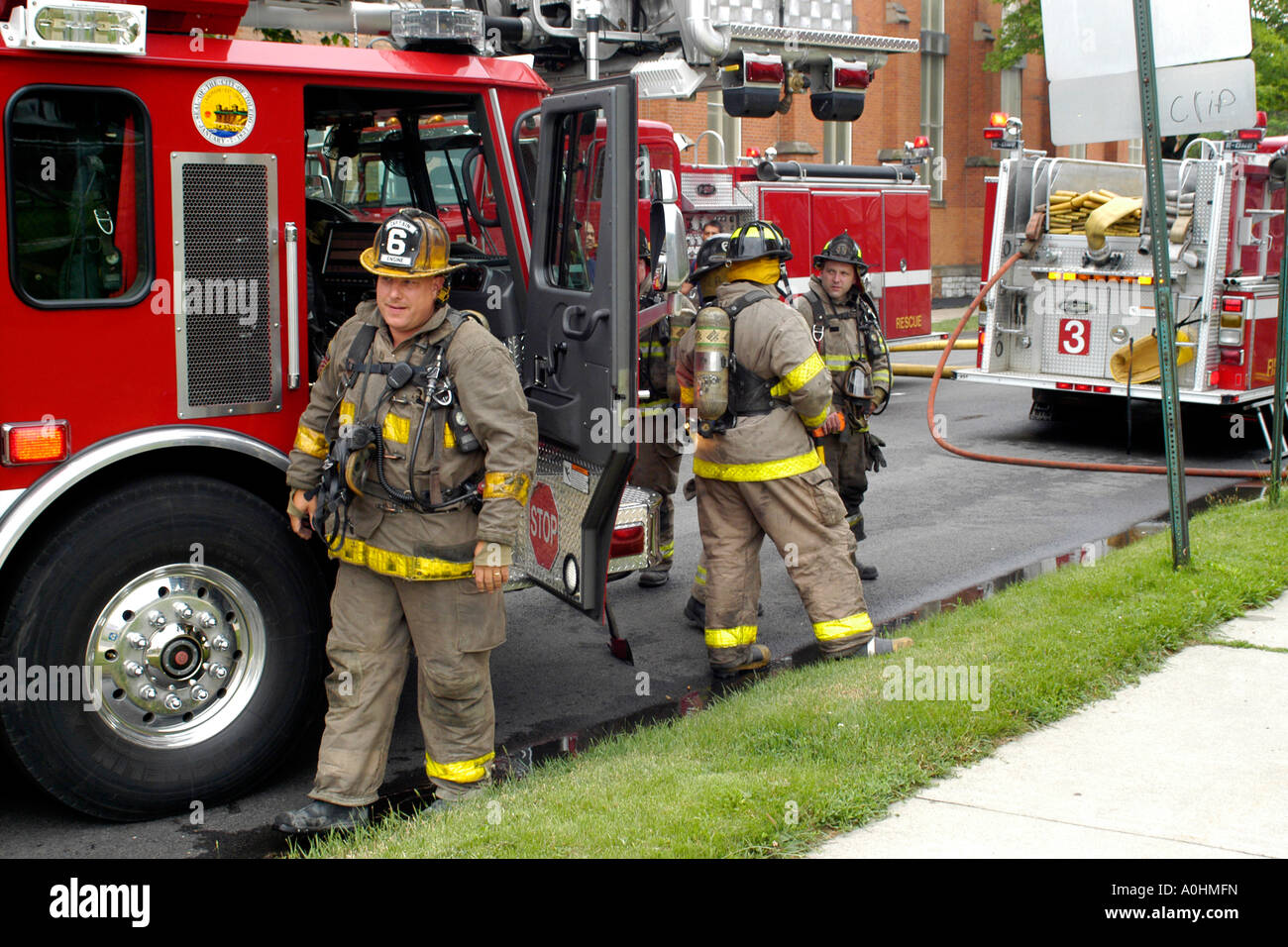 Firefighters on the job in downtown Toledo Ohio wearing breathing