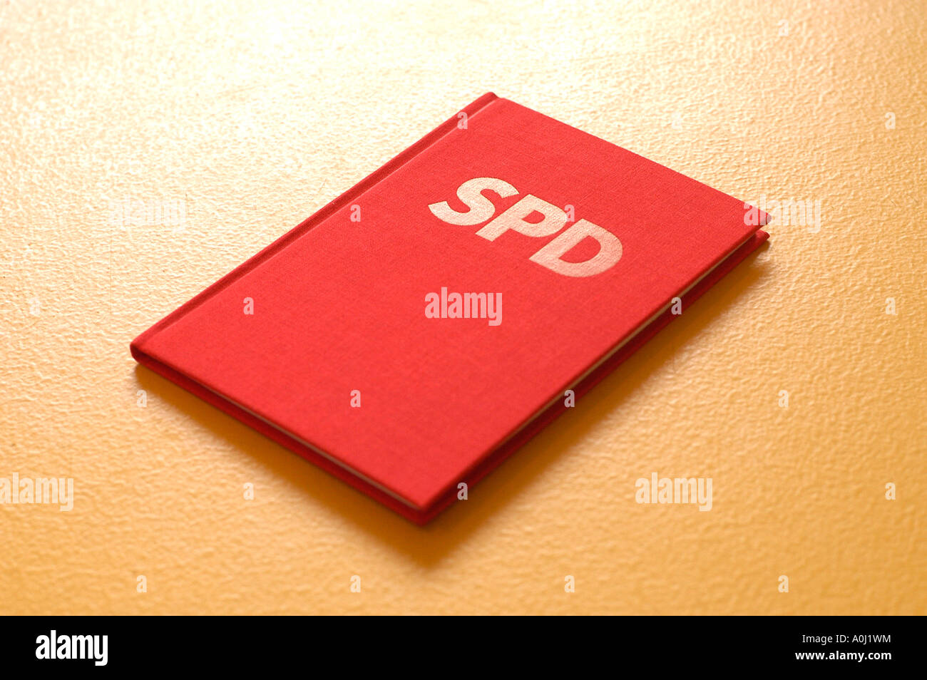 Membership-book SPD (Socialist Party Germany) on yellow background Stock Photo