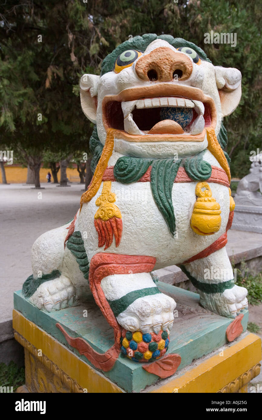 Lion statue in the Norbulingka. The Dalai Lamas former Summer Palace in Lhasa in the Tibet Autonomous region of China Stock Photo