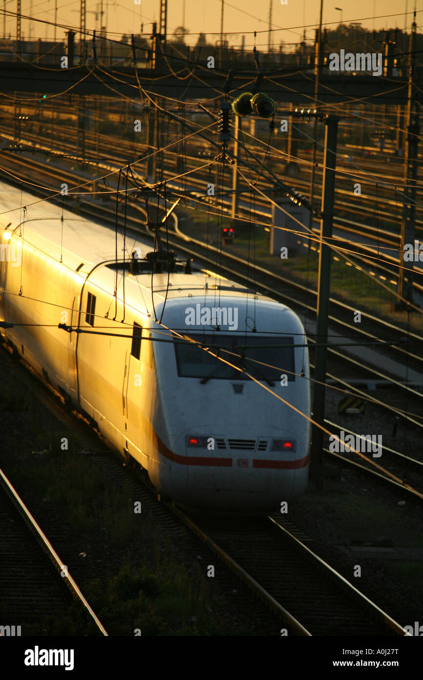 ICE train at sunset Stock Photo