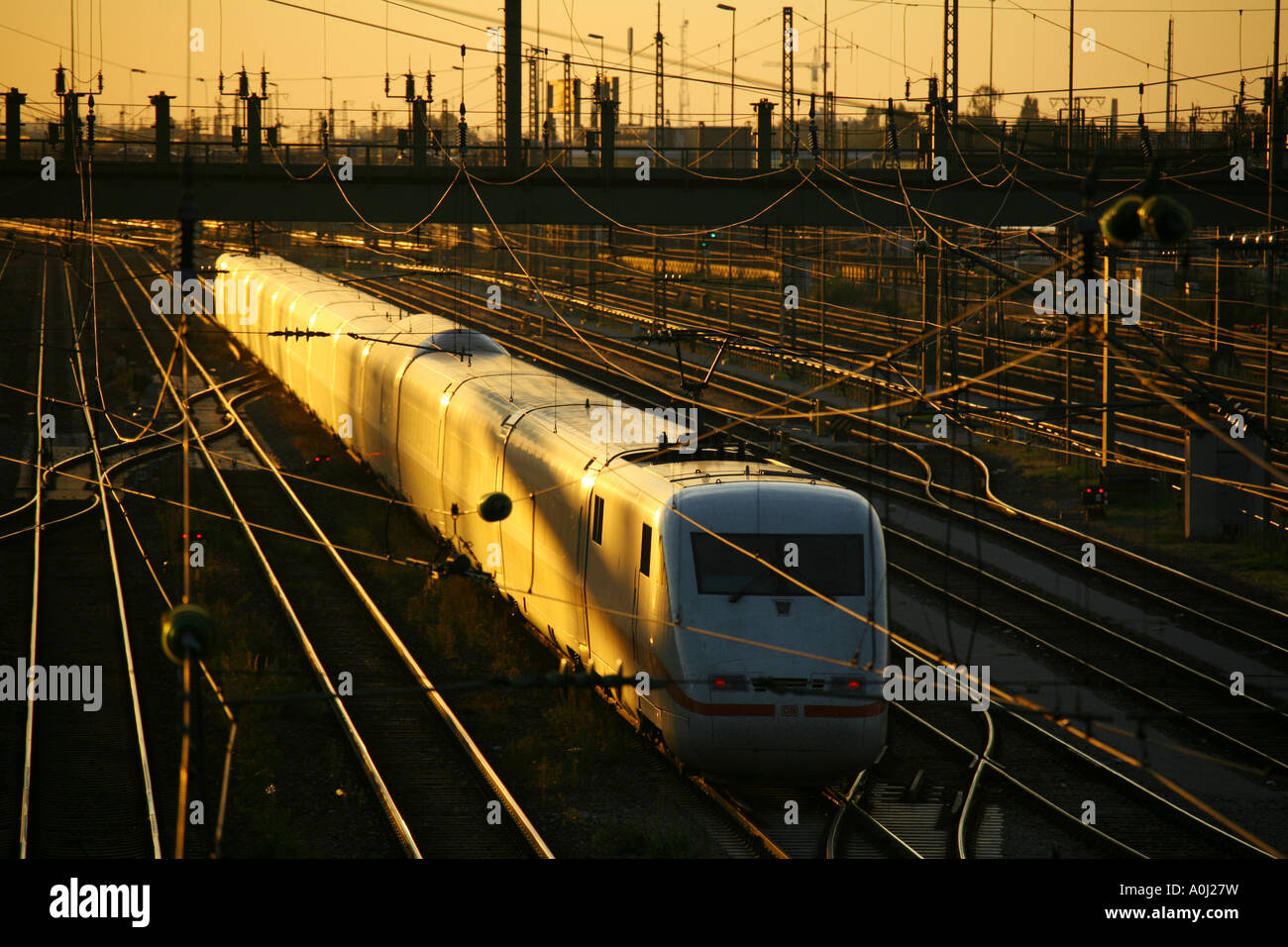 ICE train at sunset Stock Photo