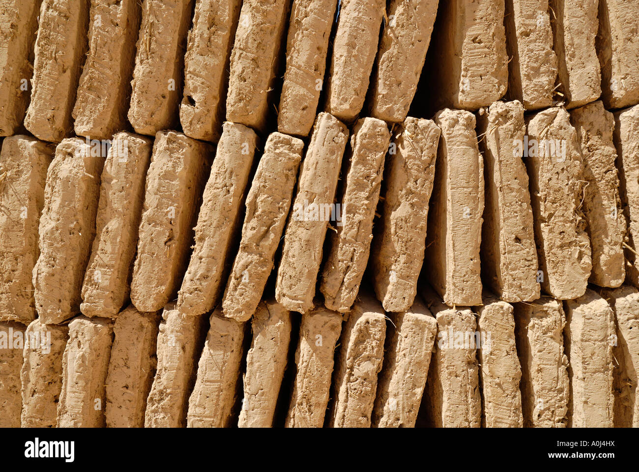 Mud brick production at Al Hajjaryn, Wadi Doan, Yemen Stock Photo