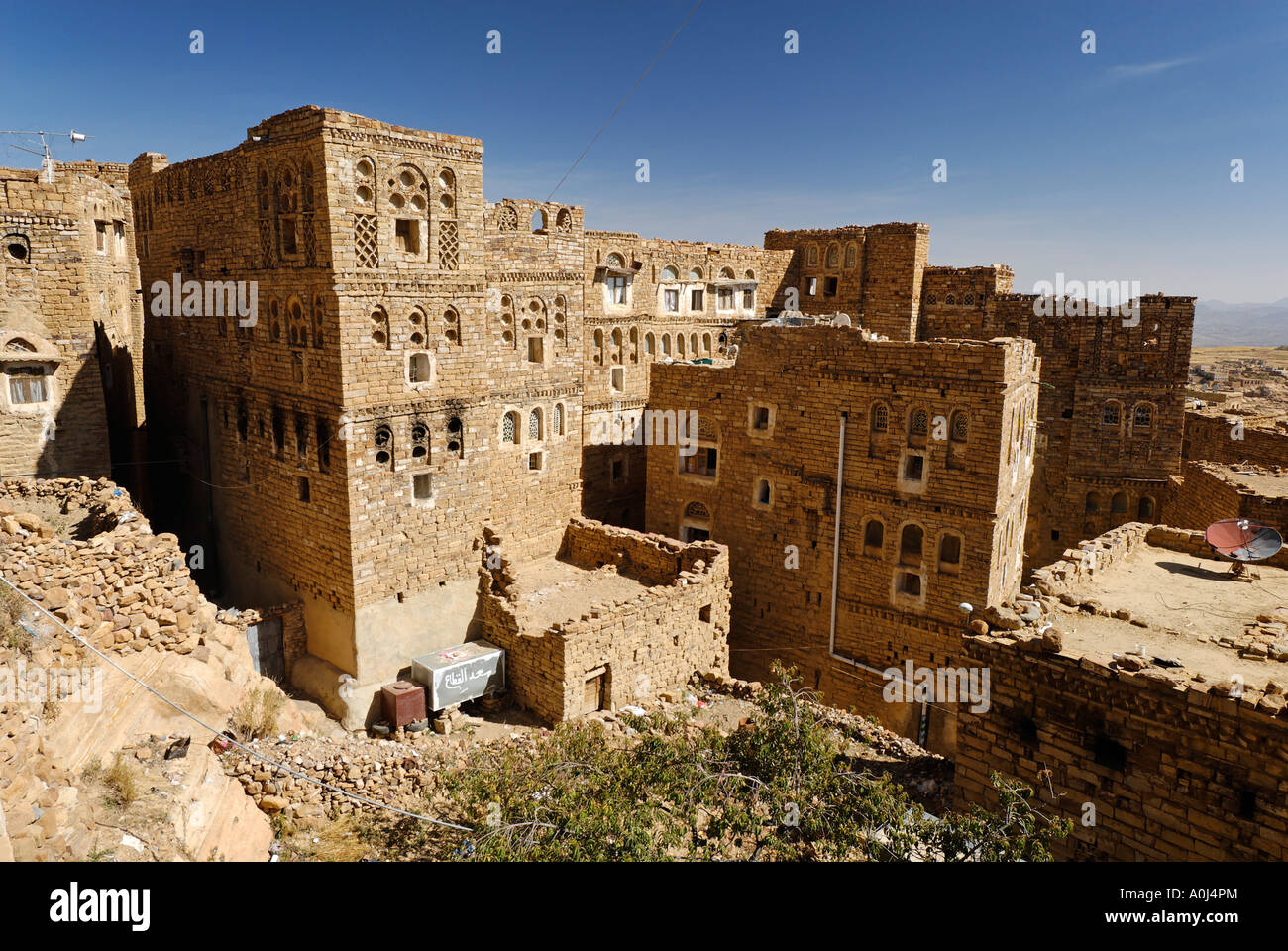 Decorated stone houses in the old town of Thula, Yemen Stock Photo Alamy