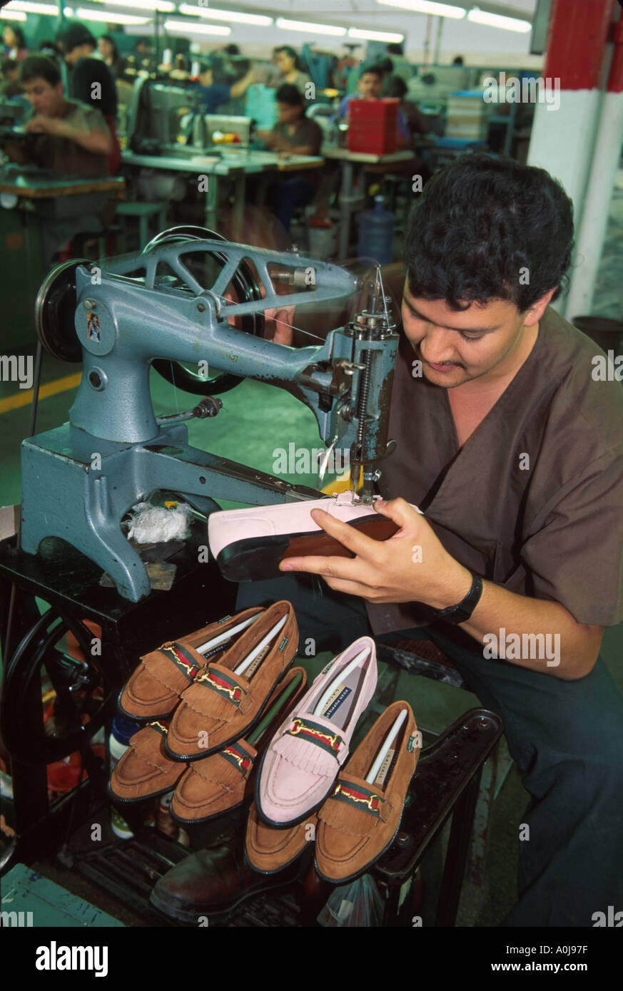 Mexico,Mexican,Central America,Pan,North Hispanic Mestizo,Guanajuato State,Leon,Emyco Shoe Factory,workers,employees,working,work,employee worker work Stock Photo