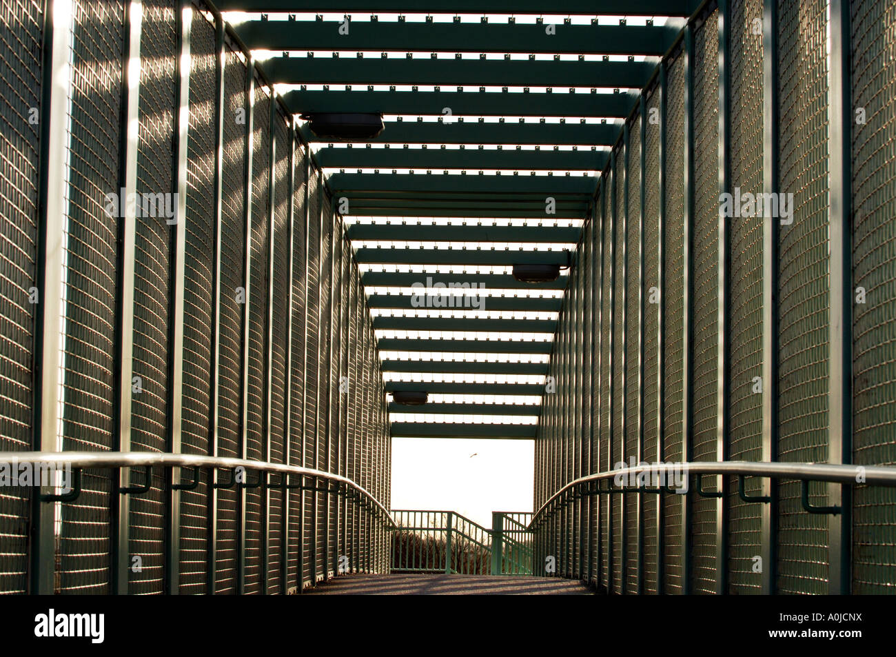 Stark modern beauty in a graceful metal and concrete bridge in Sussex. Stock Photo