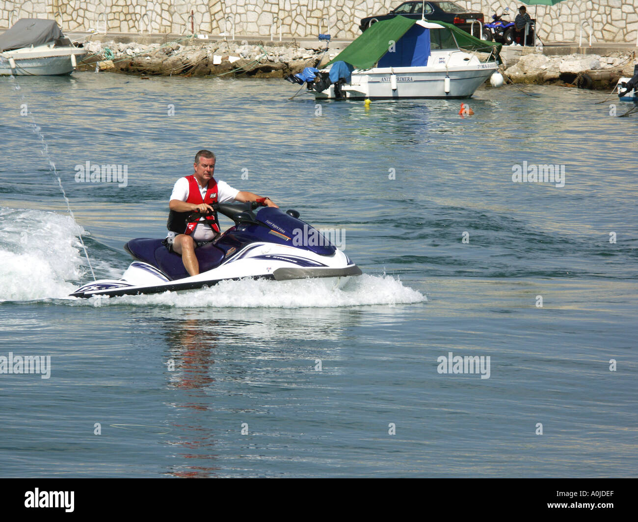 Man Riding Jet Ski , Fuengirola Port , Costa del Sol , Spain men ...