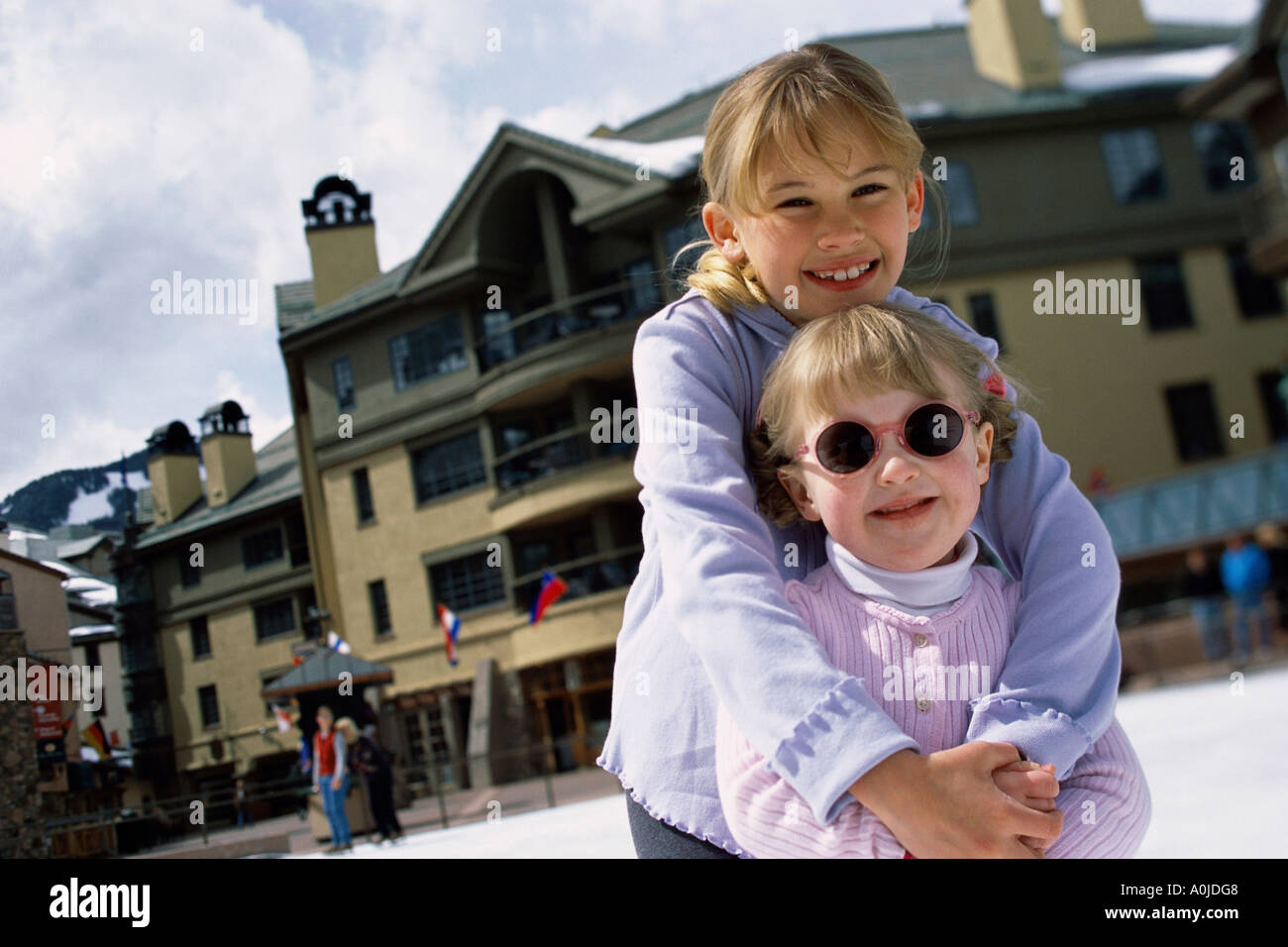Portrait of two girls smiling Stock Photo - Alamy