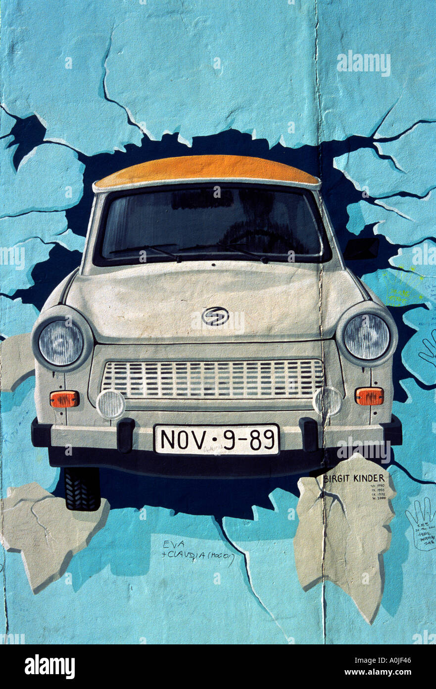 Berlin. Germany. The East Side Gallery, Test the Best, painting of a Trabant breaking through the Berlin Wall, by Birgit Kinder, 1990. Stock Photo