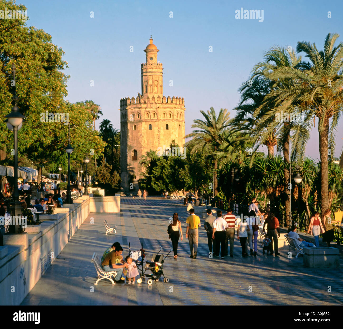 Spain Andalucia Sevilla Torre del Oro promenade people Stock Photo