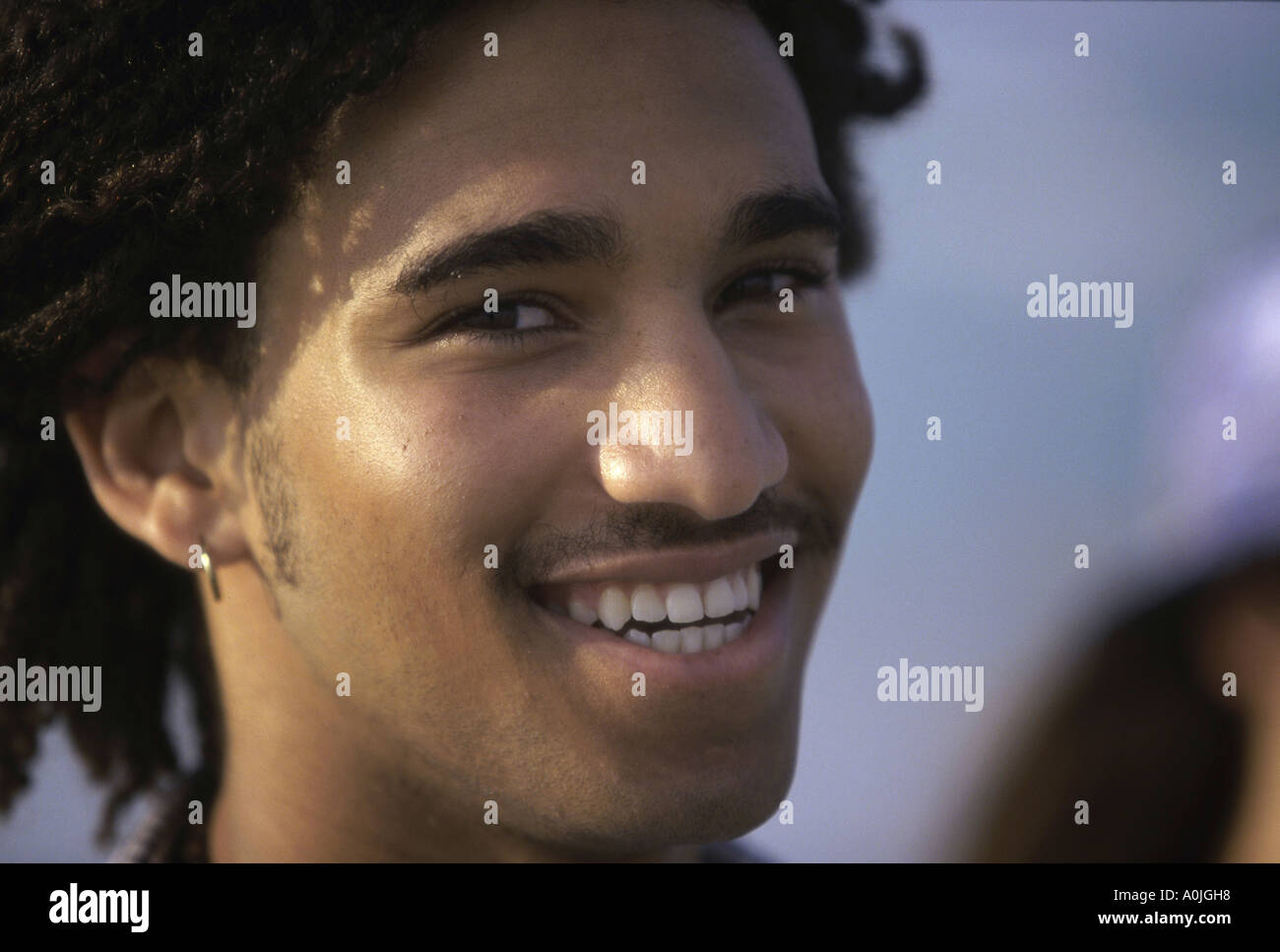 Teenage black boy smiling face hi-res stock photography and images - Alamy