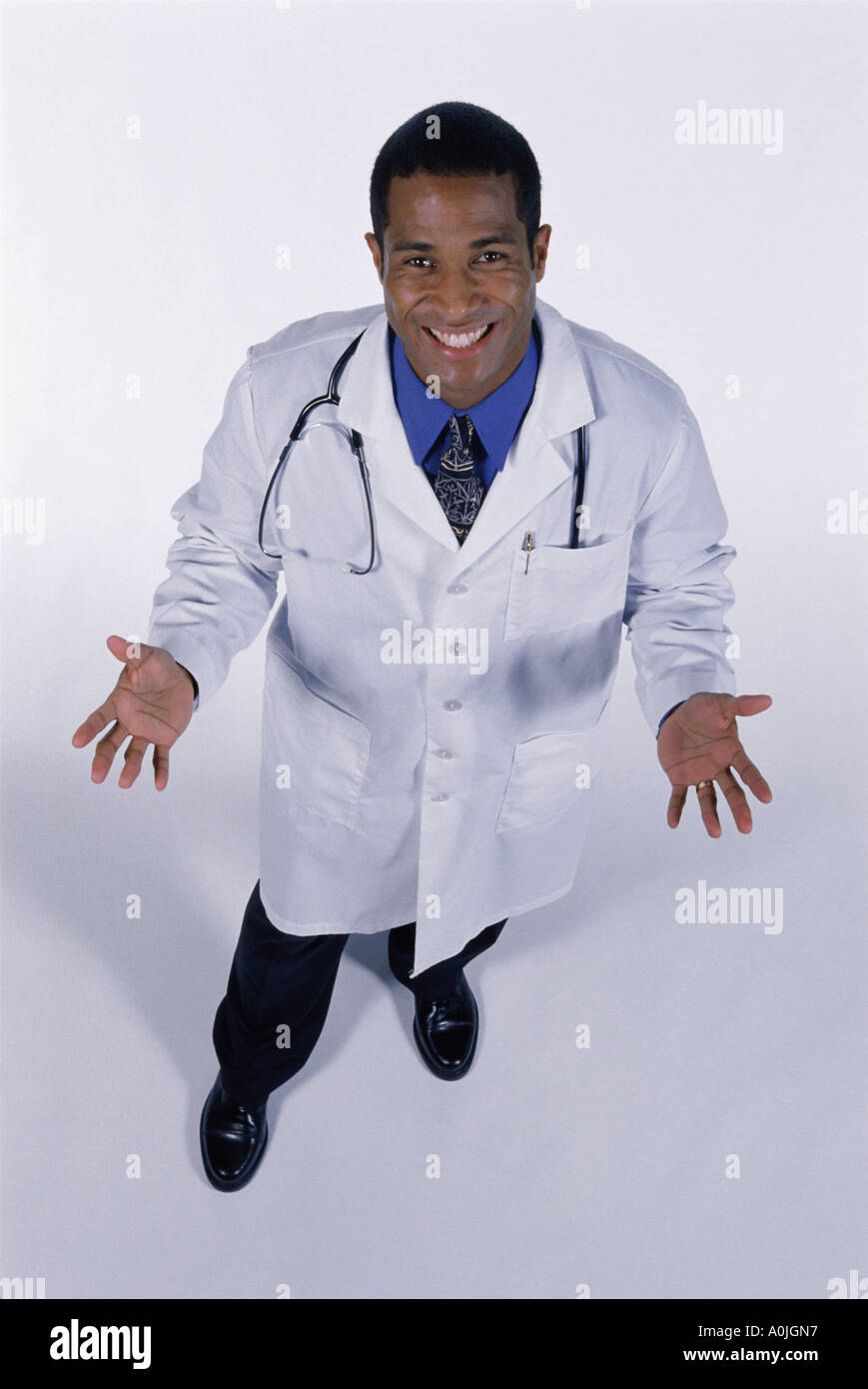 Portrait of a male doctor smiling Stock Photo - Alamy