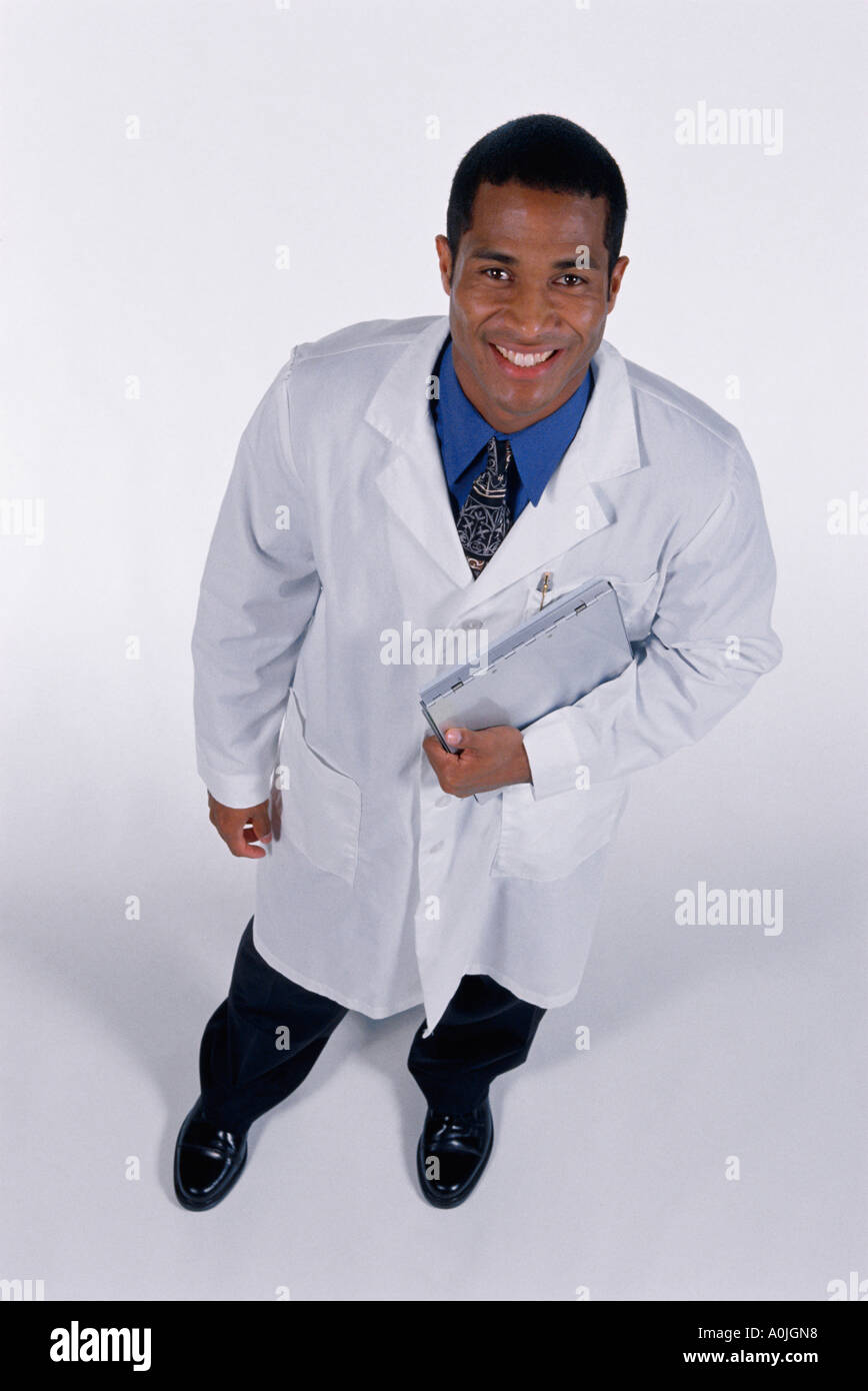 Portrait of a male doctor smiling Stock Photo - Alamy