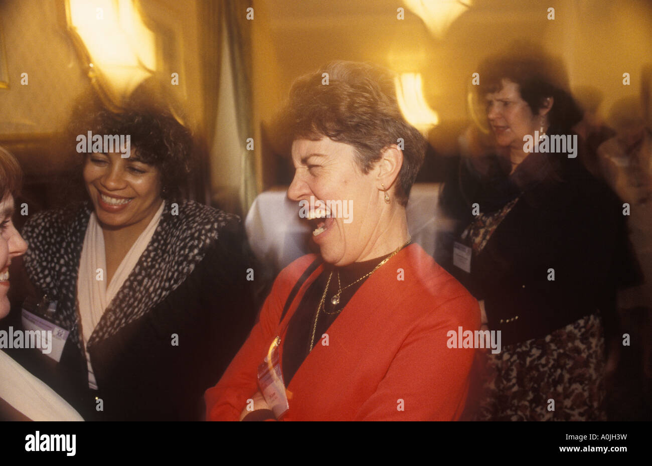 A woman howls with laughter at a reception held by the Health Visitors Association in the House of Commons, London, UK, 09/1997. Stock Photo