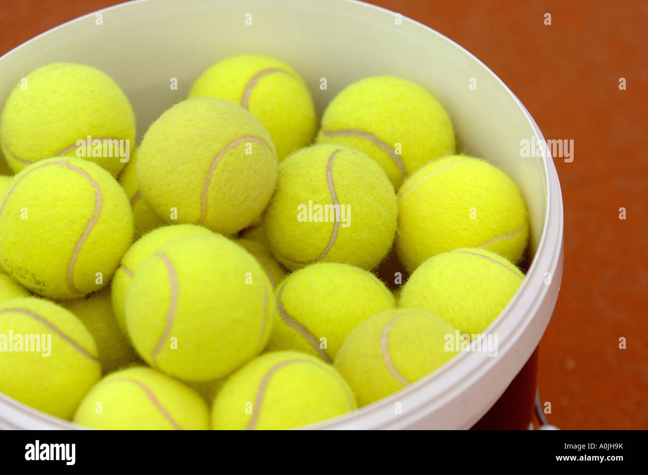 Tennis Balls in a Bucket Stock Photo Alamy