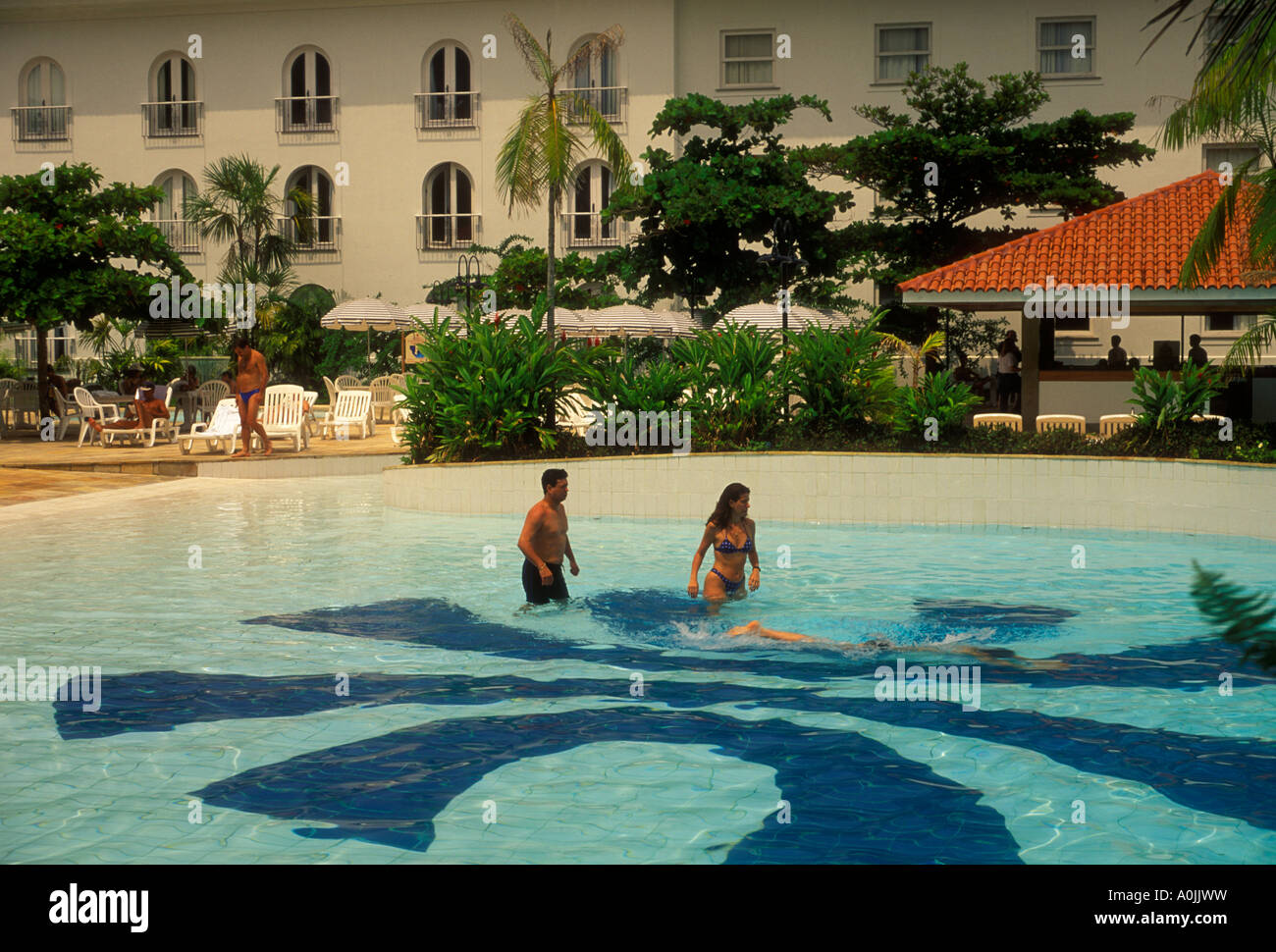 couple, freshwater swimming pool, outdoor swimming pool, swimming pool, Tropical Hotel, capital city of Manaus, Amazonas State, Brazil, South America Stock Photo