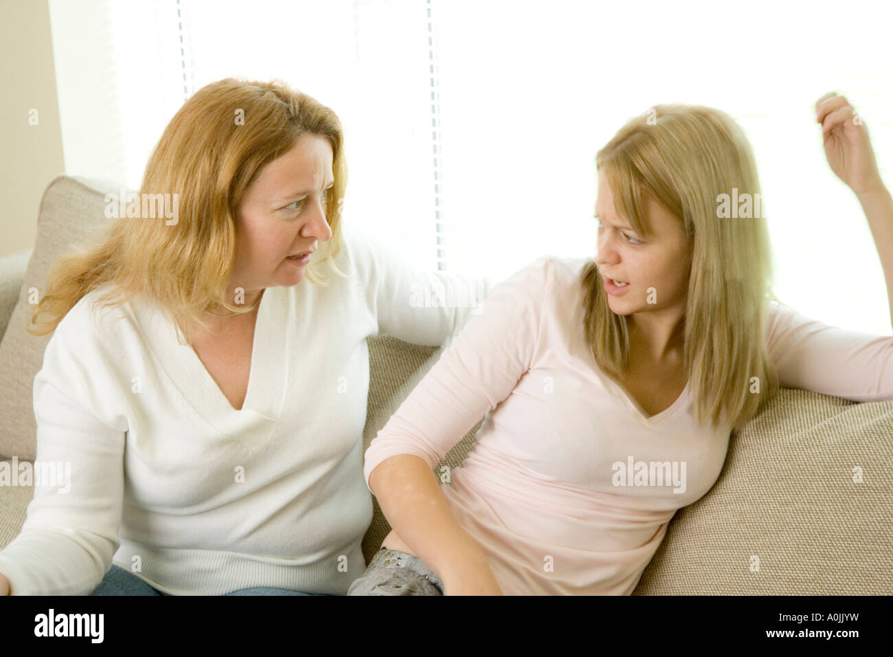 Mother and daughter arguing Mother and daughter arguing-2457