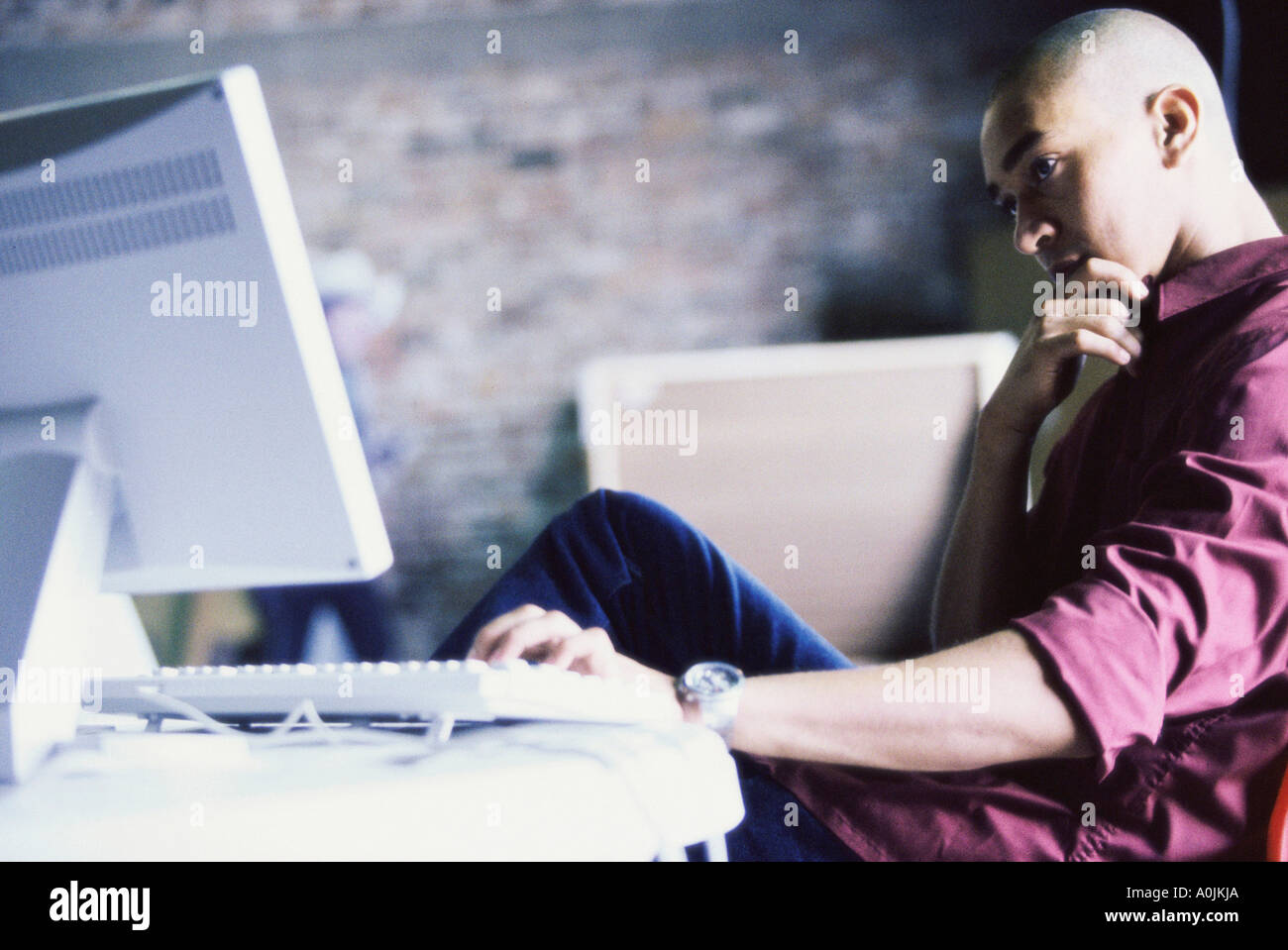 One man using computer hi-res stock photography and images - Alamy