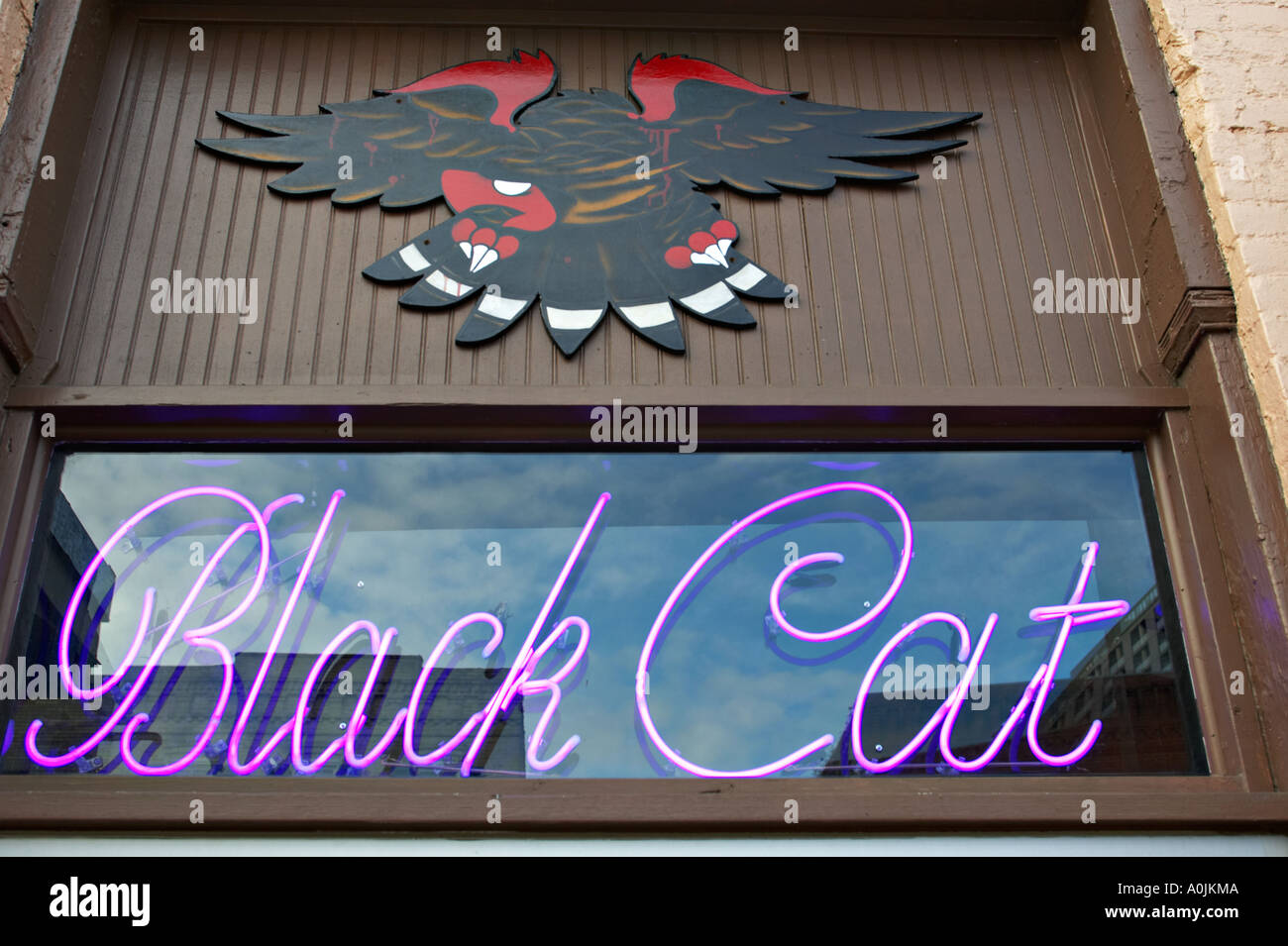 TEXAS Austin Black Cat neon sign on building on Sixth Street entertainment district Stock Photo