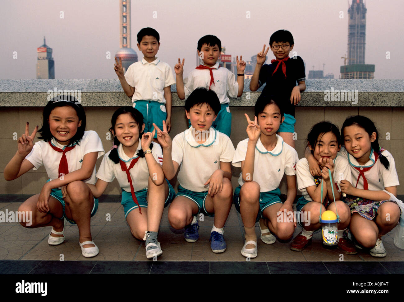 Chinese students, students, schoolboys, schoolgirls, schoolchildren, boys, girls, The Bund, Waitan, Shanghai, Shanghai Municipality, China, Asia Stock Photo