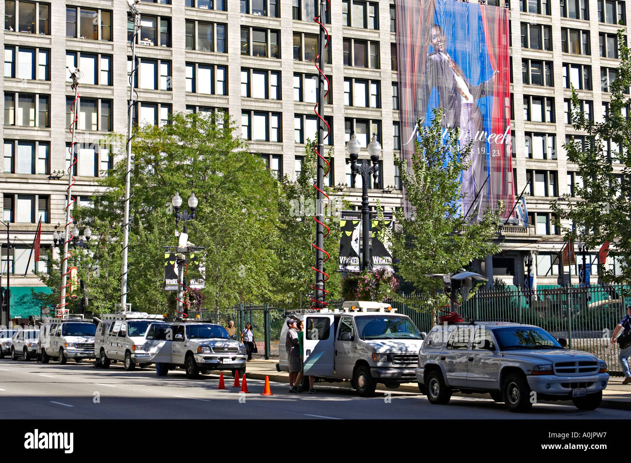 STREET SCENE Chicago Illinois Several panel vans for local television