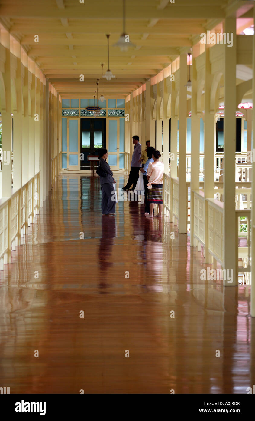 Interior view of Phra Ratchaniwet Marukhathaiyawan in Cha am Southern Thailand Built in 1923 for summer use by King Rama VI it was designed by an Italian architect Constructed out of golden teakwood the building is composed of verandas pavilions and villas Two wooden pavilions face the sea Stock Photo