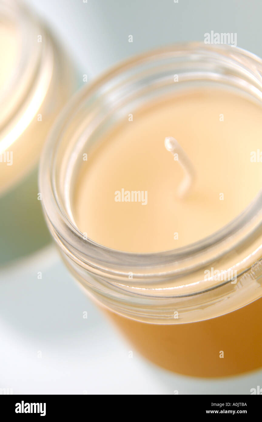 Scented candles in screwtop glass jars Stock Photo Alamy