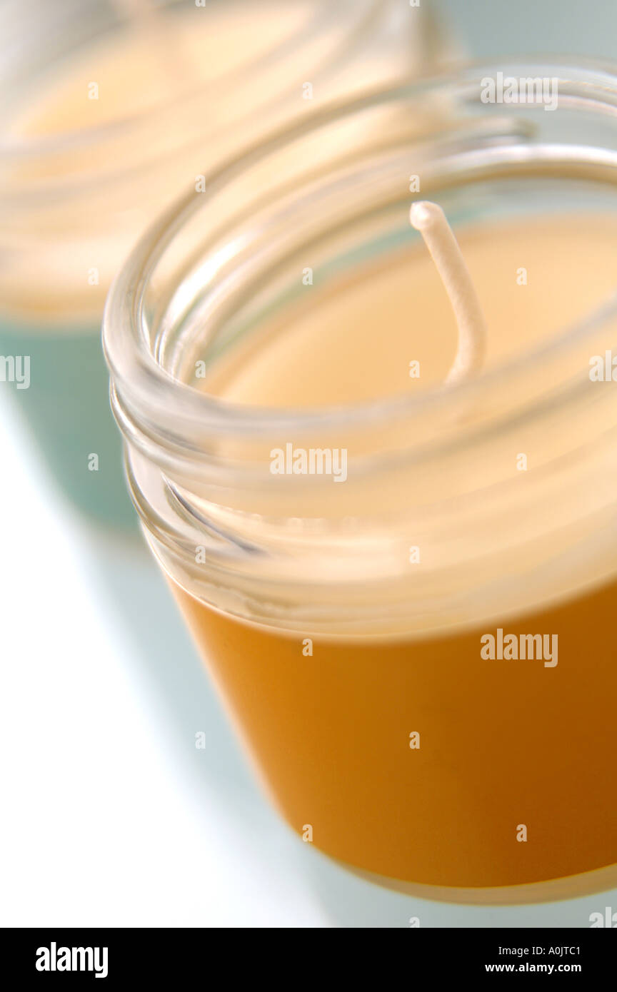 Scented candles in screwtop glass jars Stock Photo Alamy