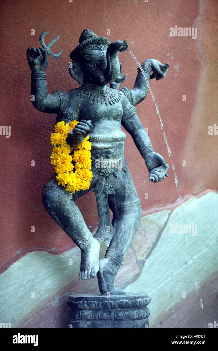 A statue water fountain of Ganesha the Hindu god at the Tamarind