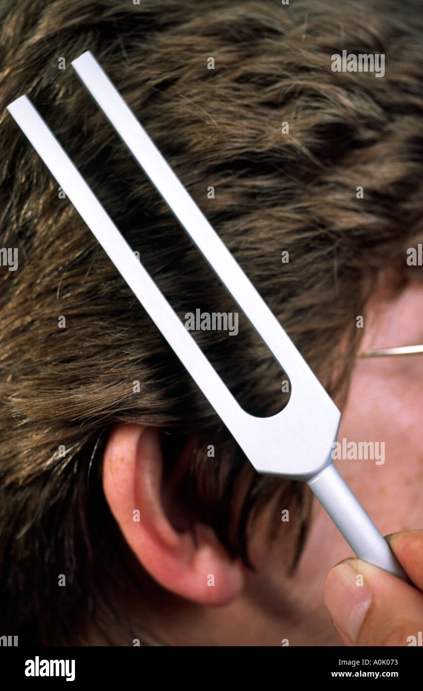 Tuning fork hearing test Stock Photo Alamy