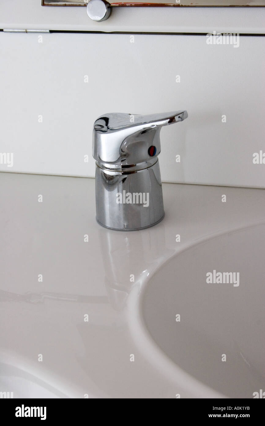 colour image off a close up shot of a tap and sink in a boats interior