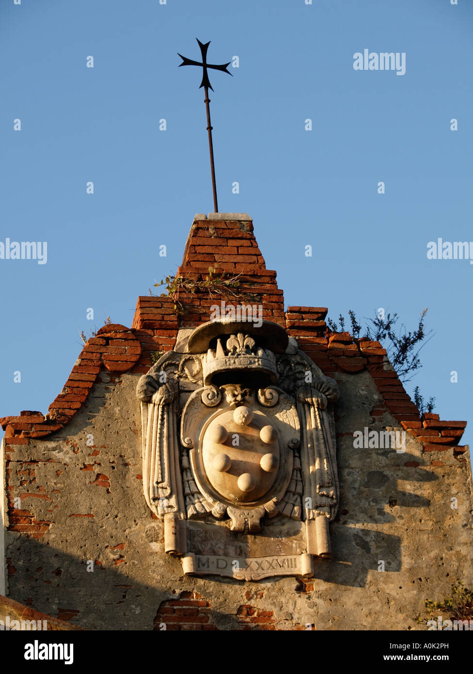 The de Medici family emblem on an old warehouse along the Arno river in Pisa Tuscany Italy Stock Photo