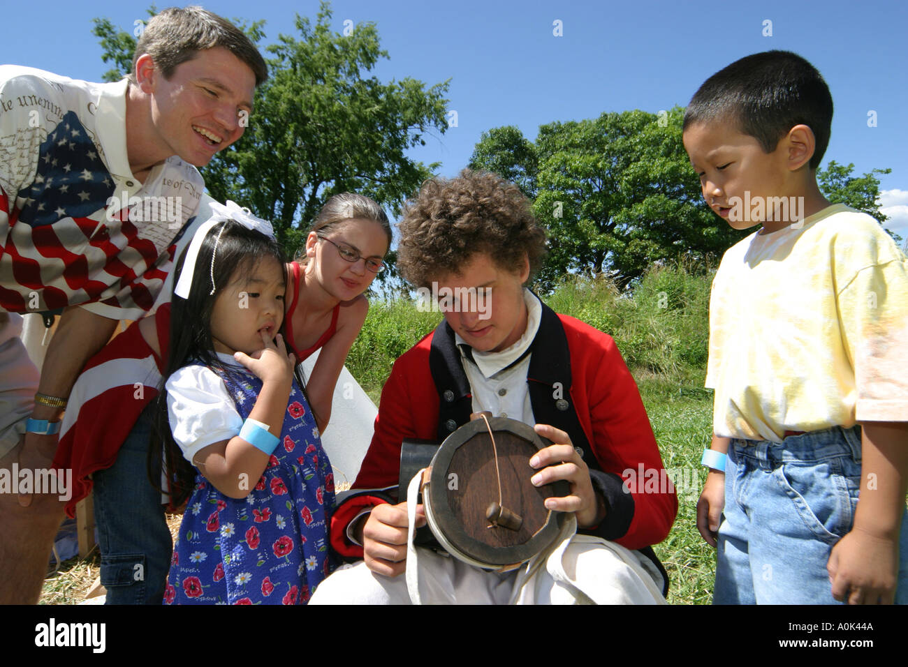 Ohio Perrysburg,Fort Meigs historic Site,Muster on the Maumee,costume,regalia,soldier,Asian Asians ethnic immigrant immigrants minority,girl girls,you Stock Photo