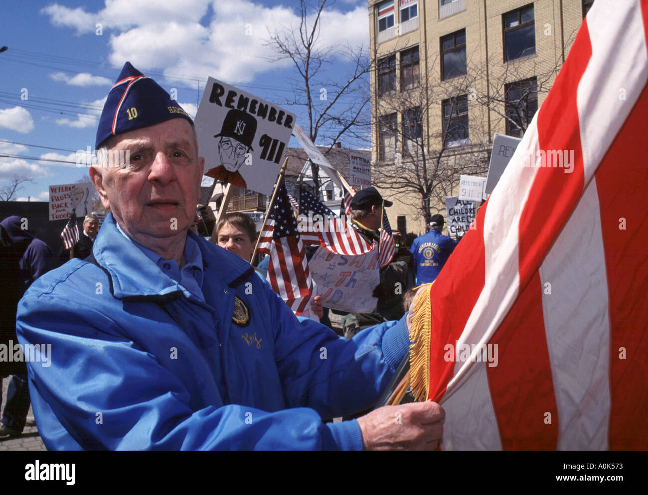 Members of the American Legion and VFW counter demonstrate against an anti war march by Women in Black Stock Photo