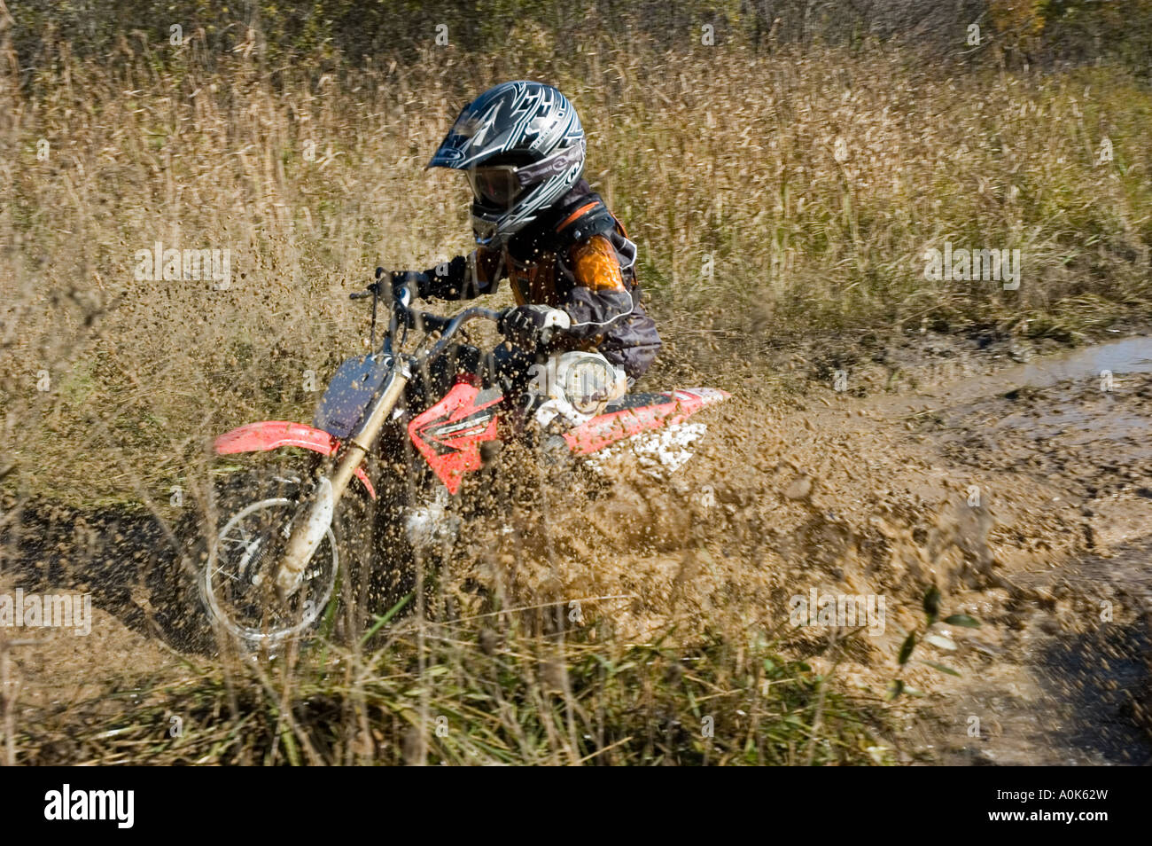 boys riding dirt bikes