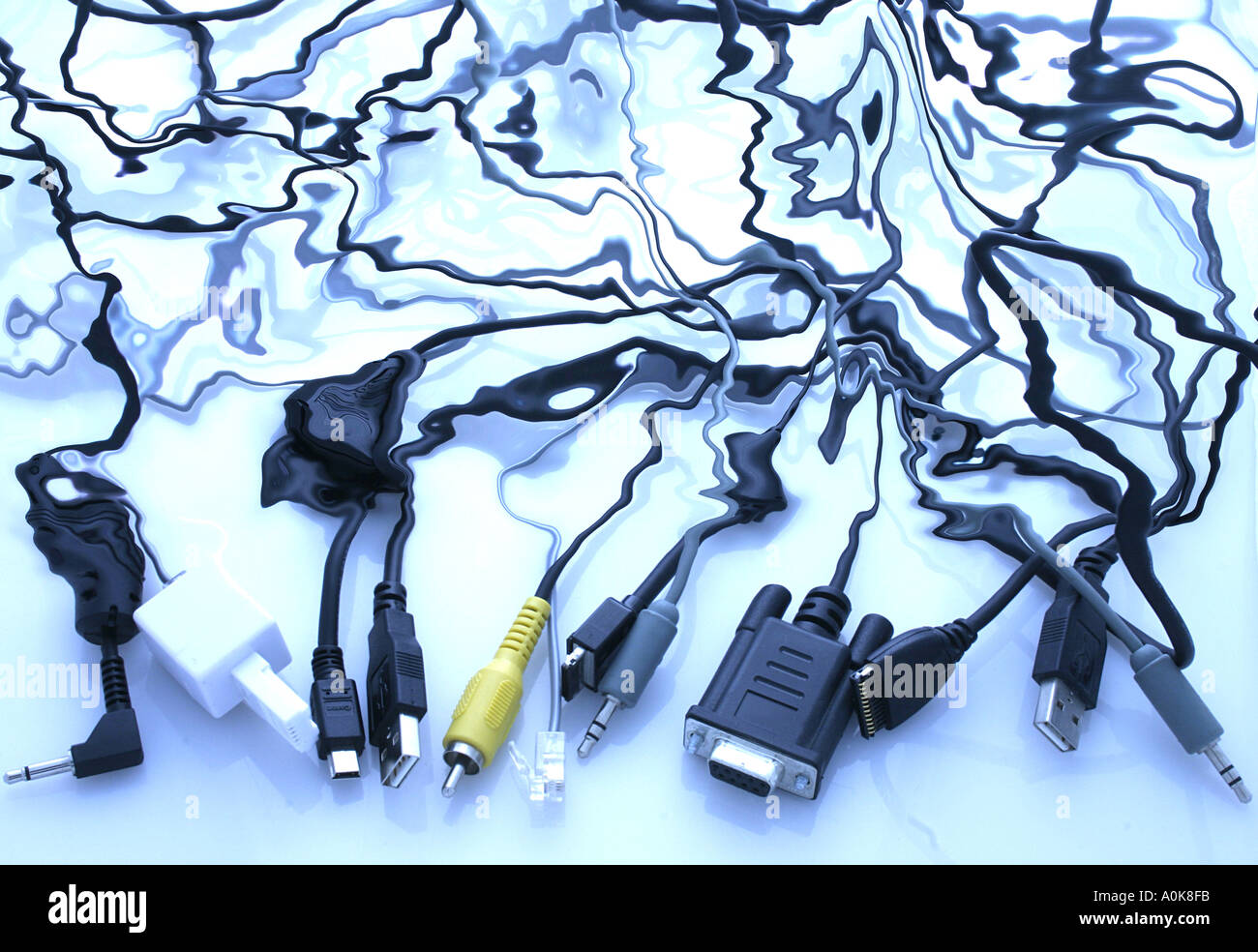 Conceptual image showing a knotted bunch of computer wires and cables
